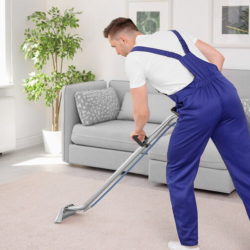 carpet-cleaning-tech Service Technician Cleaning Carpet in Residence
